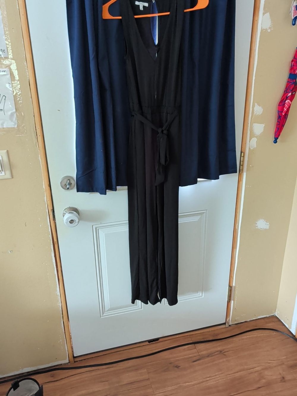Maurices Black Sleeveless V-Neck Jumpsuit with Waist Tie